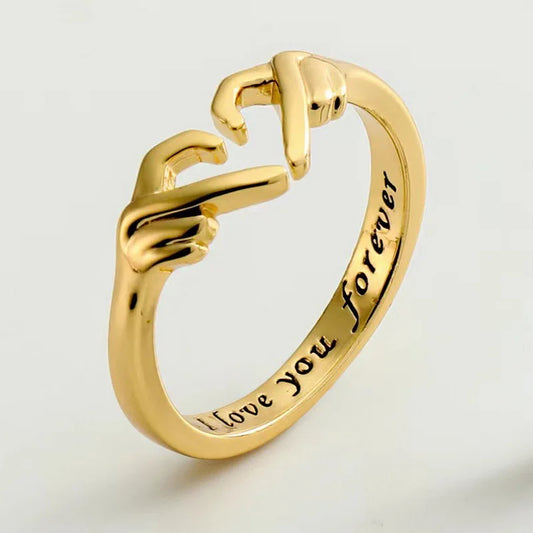 “Romantic Heart Hand Hug Ring - Adjustable Couple Ring for Wedding & Dating.”