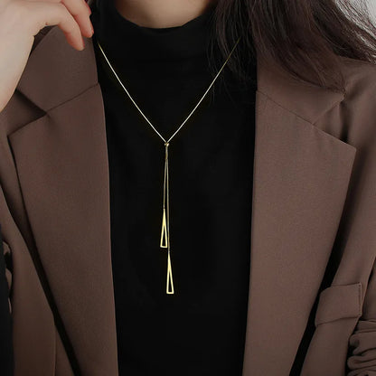 “Tassel Necklace for Women - Gold/Silver Triangle Pendant Long Necklace.”