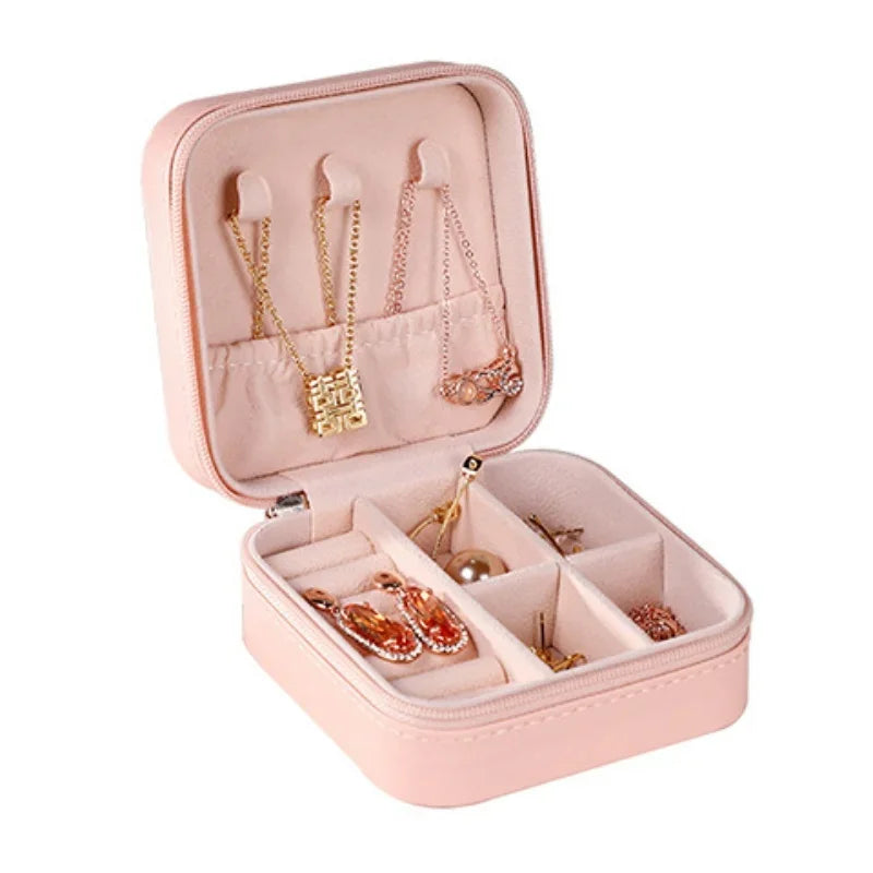 “Portable mini jewelry storage box, PU leather, for earrings, necklaces, rings.”