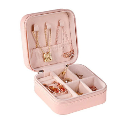 “Portable mini jewelry storage box, PU leather, for earrings, necklaces, rings.”