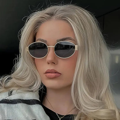 “Retro oval sunglasses, luxury metal frame, classic unisex design for driving.”