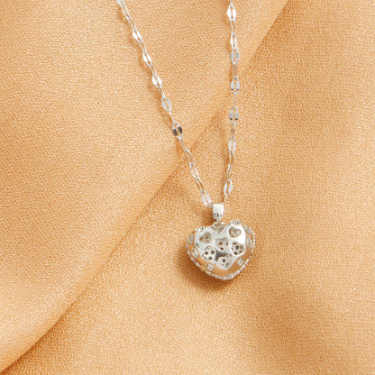 “Cubic Zirconia Heart Pendant Necklace - Gold-Plated Stainless Steel for Women.”