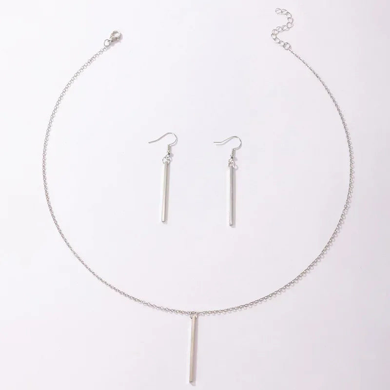“Elegant Gold Stick Jewelry Set - Necklace & Earrings for Women.”