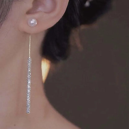 “Korean Tassel Pearl Drop Earrings - Luxury Gold Wedding Jewelry.”