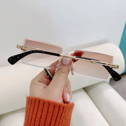“Luxury rectangle rimless sunglasses, gradient colors, stylish unisex design.”