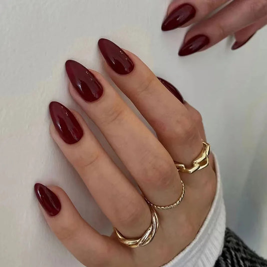 “24pcs mid-length almond-shaped wine red press-on nails.”