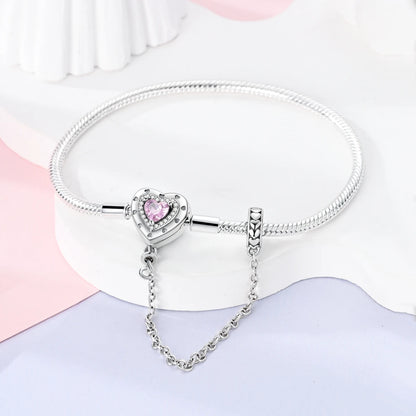 “Silver plated charm bracelet with safety chain, snake chain fits beads, perfect gift.”