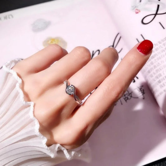 “Elegant 925 silver promise ring with solitaire zircon, perfect bridal jewelry.”