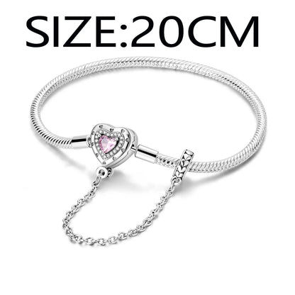 “Silver plated charm bracelet with safety chain, snake chain fits beads, perfect gift.”