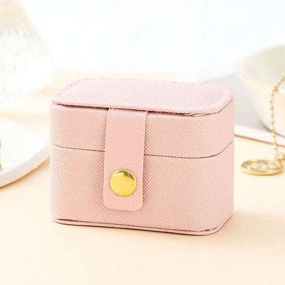“Mini Portable Jewelry Storage Bag Leather Travel Box for Rings, Necklaces, Earrings.”
