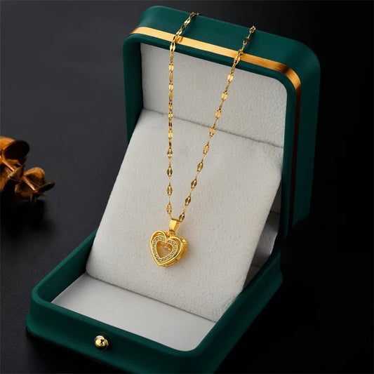 “Cute Beating Heart Crystal Pendant Necklace - Korean Fashion Stainless Steel Clavicle Chain.”