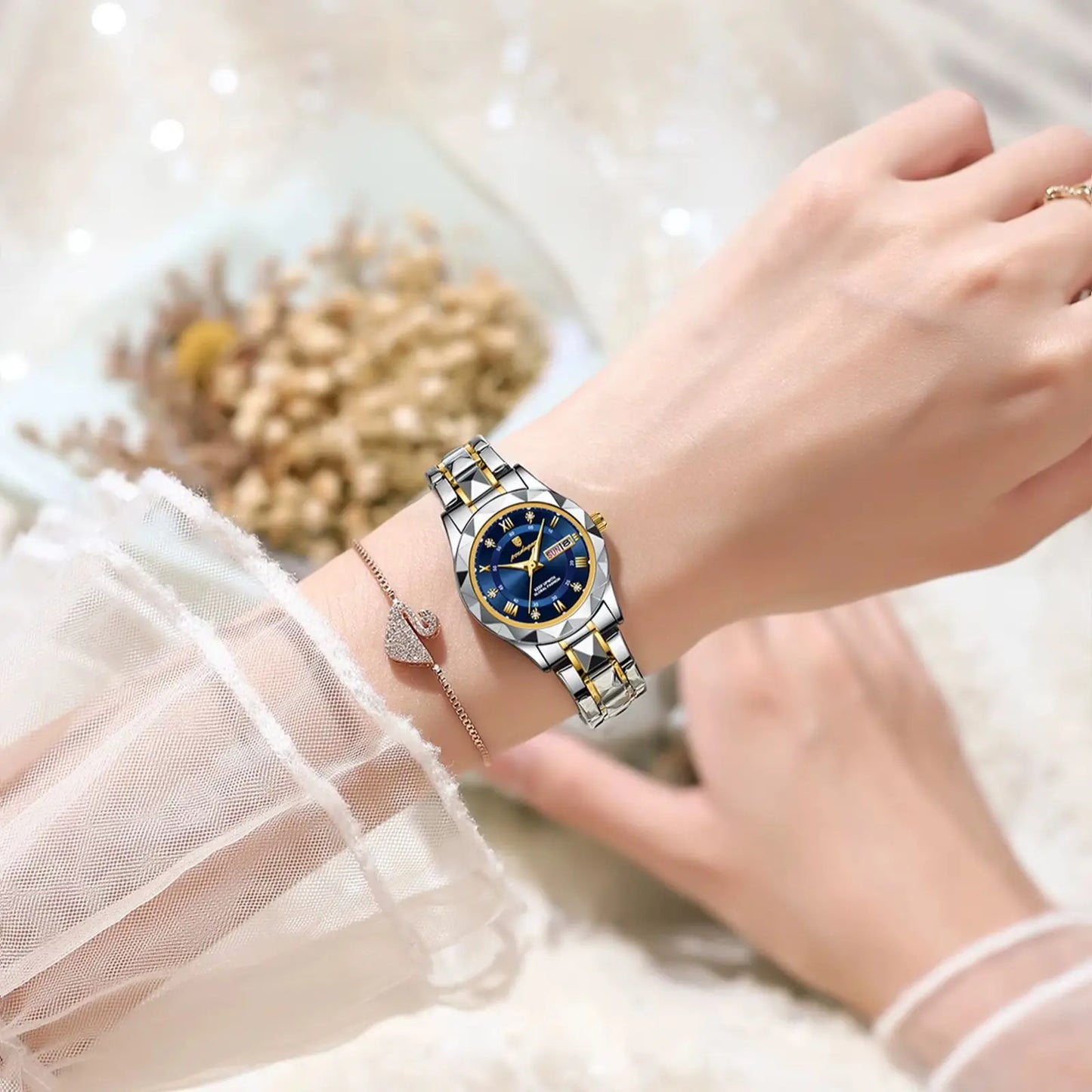 “Elegant waterproof women’s watch with luminous, week, date, stainless steel.”