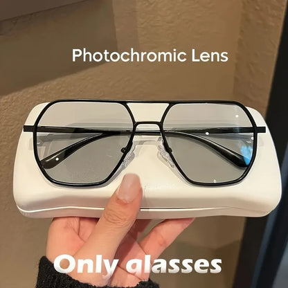 “Square polarized photochromic glasses with metal frame, ideal for driving.”