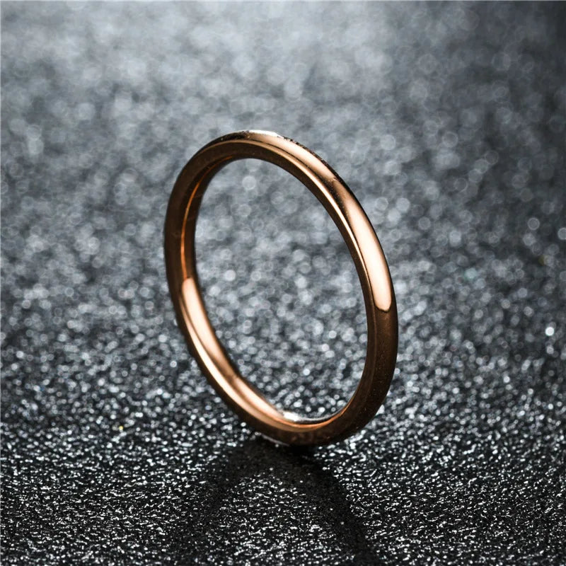 “2mm Thin Stainless Steel Rings - Rose Gold Titanium Steel for Women & Girls.”