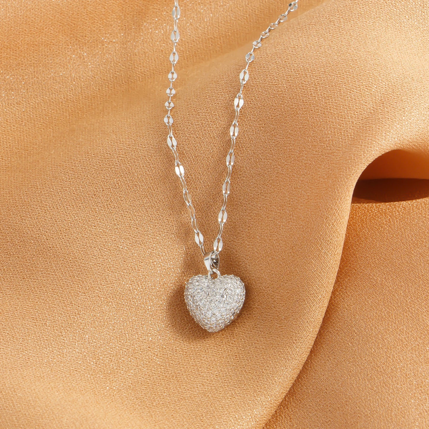 “Cubic Zirconia Heart Pendant Necklace - Gold-Plated Stainless Steel for Women.”