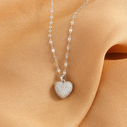 “Cubic Zirconia Heart Pendant Necklace - Gold-Plated Stainless Steel for Women.”