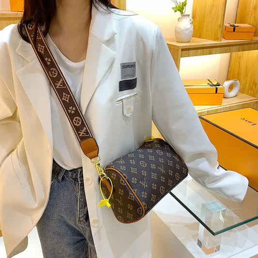 “luxury women’s clutch bag, designer crossbody purse, travel tote handbag, elegant and stylish.”