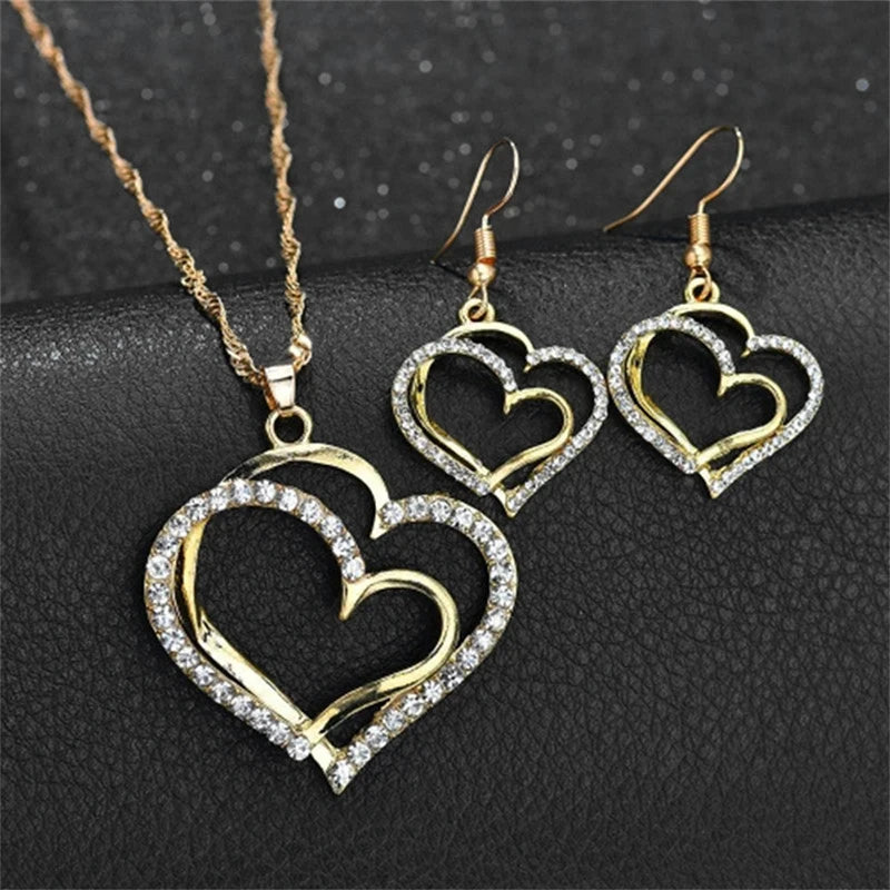 “3-Piece Heart-Shaped Jewelry Set - Earrings, Pendant, Necklace with Rhinestones.”