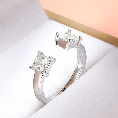 “1CTTW 4.5mm Princess-Cut Moissanite Ring, Adjustable Sterling Silver Wedding Band.”