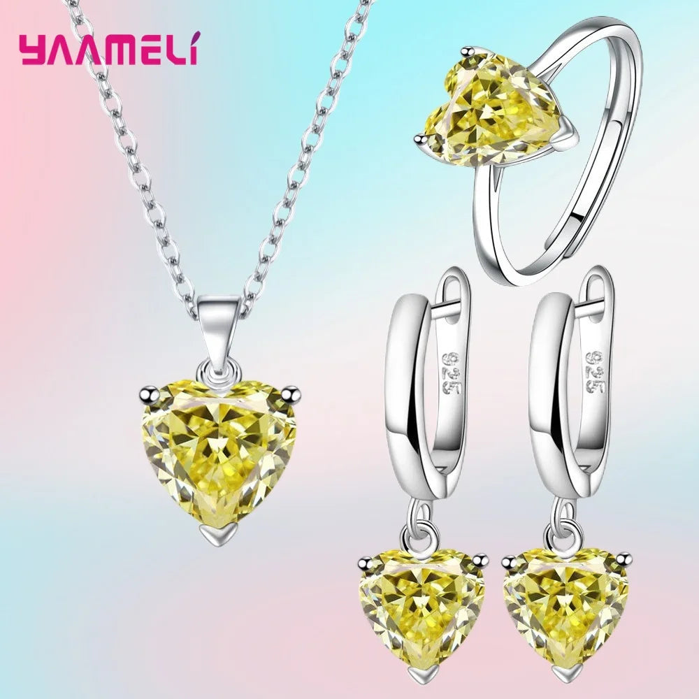 “Romantic 925 Sterling Silver Jewelry Set - Heart-Shaped Zircon Earrings, Necklace, and Ring.”