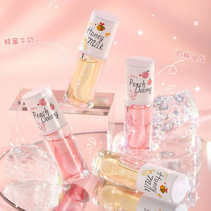 “Peach Milk Honey Lip Oil – Moisturizing, Fades Lip Lines, Water Gloss Effect with Big Brush”