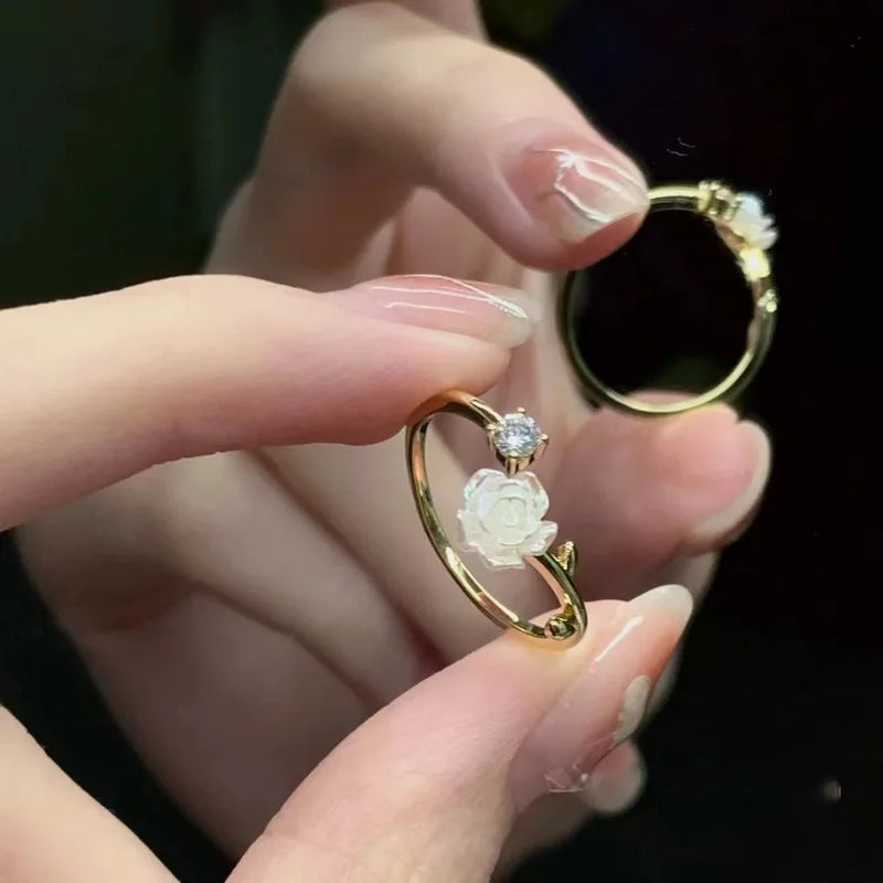 “Luxury Zircon Flower Rings for Women - Rose, Cherry Blossom, Tulip Design, Adjustable.”