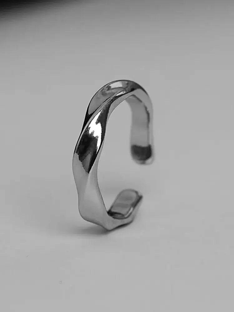 “Mobius Wave Ring - Silver Color Alloy Open Ring for Women & Men, Retro Style.”