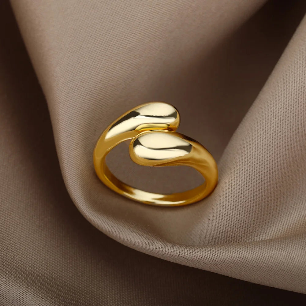 “Trendy Gold Stainless Steel Rings for Women - Perfect Wedding & Couple Jewelry.”