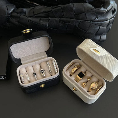 “Mini Portable Jewelry Storage Bag Leather Travel Box for Rings, Necklaces, Earrings.”