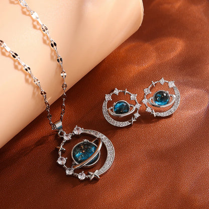 “Luxury gold titanium steel necklace with planet, moon, astronaut pendants.”