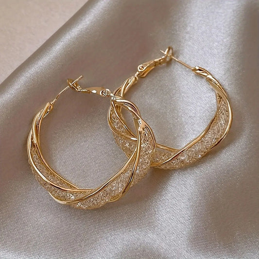 “Elegant Shiny Mesh Rhinestone Hoop Earrings - Vintage Gold Color Twisted Round Design.”