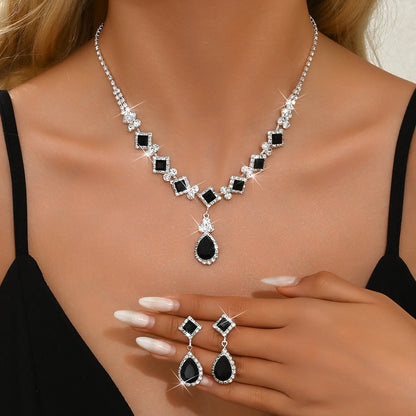 “3-piece claw chain geometric droplet earrings and necklace set, elegant wedding party gift.”