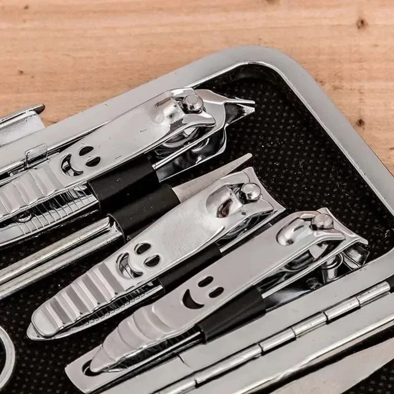 “Set of 11 happy face nail tools including file and scissors.”