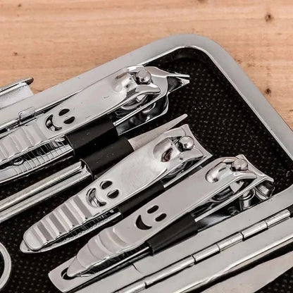 “Set of 11 happy face nail tools including file and scissors.”