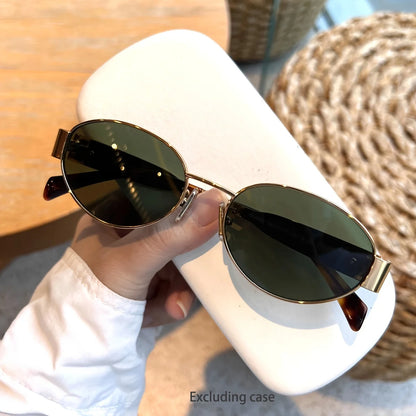 “Oval sunglasses with metal frame, trendy unisex design, classic shades.”