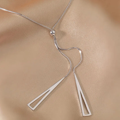“Tassel Necklace for Women - Gold/Silver Triangle Pendant Long Necklace.”