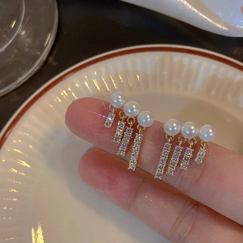 “Korean Tassel Pearl Drop Earrings - Luxury Gold Wedding Jewelry.”