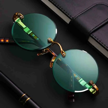 “Classic rimless sunglasses, retro round design, crystal green lenses for outdoor wear.”