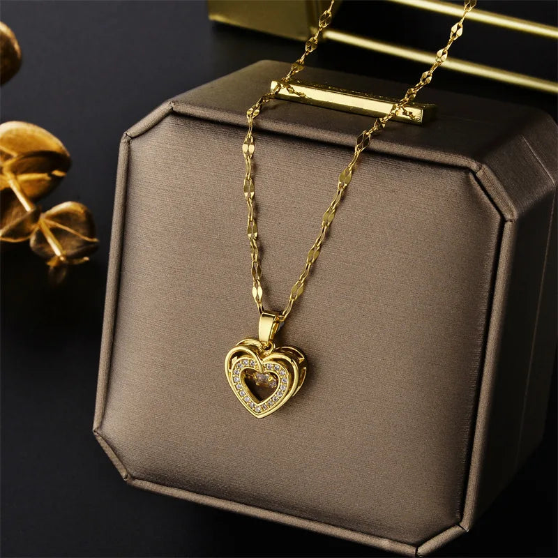 “Cute Beating Heart Crystal Pendant Necklace - Korean Fashion Stainless Steel Clavicle Chain.”