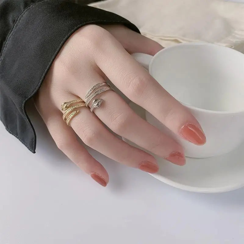 “Gold snake rings, adjustable, punk hip-hop style, stainless steel with zircon details.”