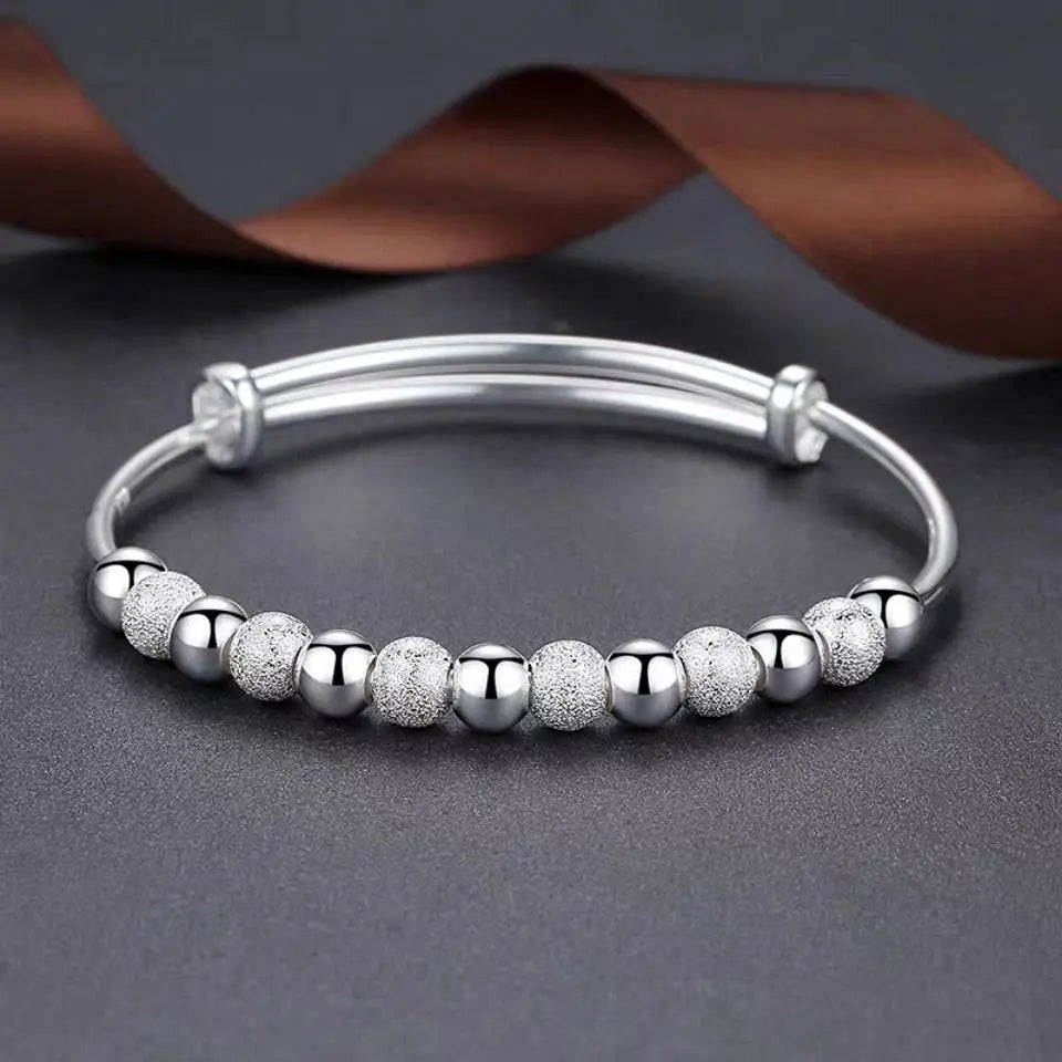 “925 Silver-Color Luxury Charms Beads Bracelet - Adjustable Fashion Jewelry for Women.”