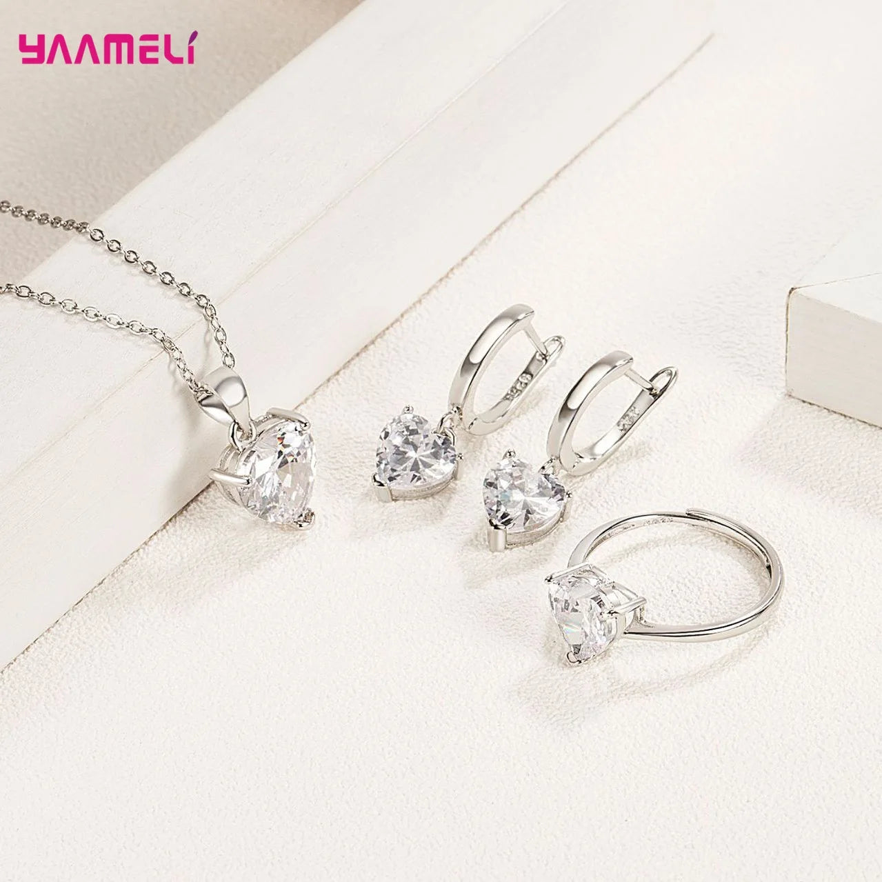 “Romantic 925 Sterling Silver Jewelry Set - Heart-Shaped Zircon Earrings, Necklace, and Ring.”