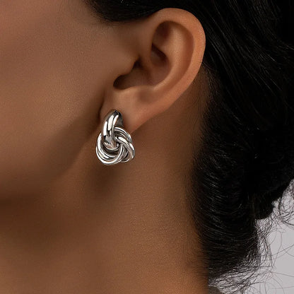 “Stainless Steel Chunky Hoop Earrings - Gold Double Ring Geometric Design.”