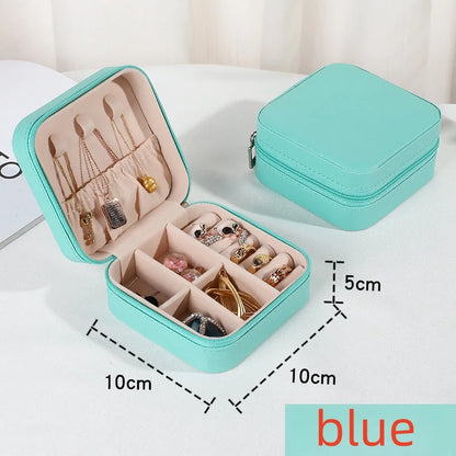 “Portable mini jewelry storage box, PU leather, for earrings, necklaces, rings.”