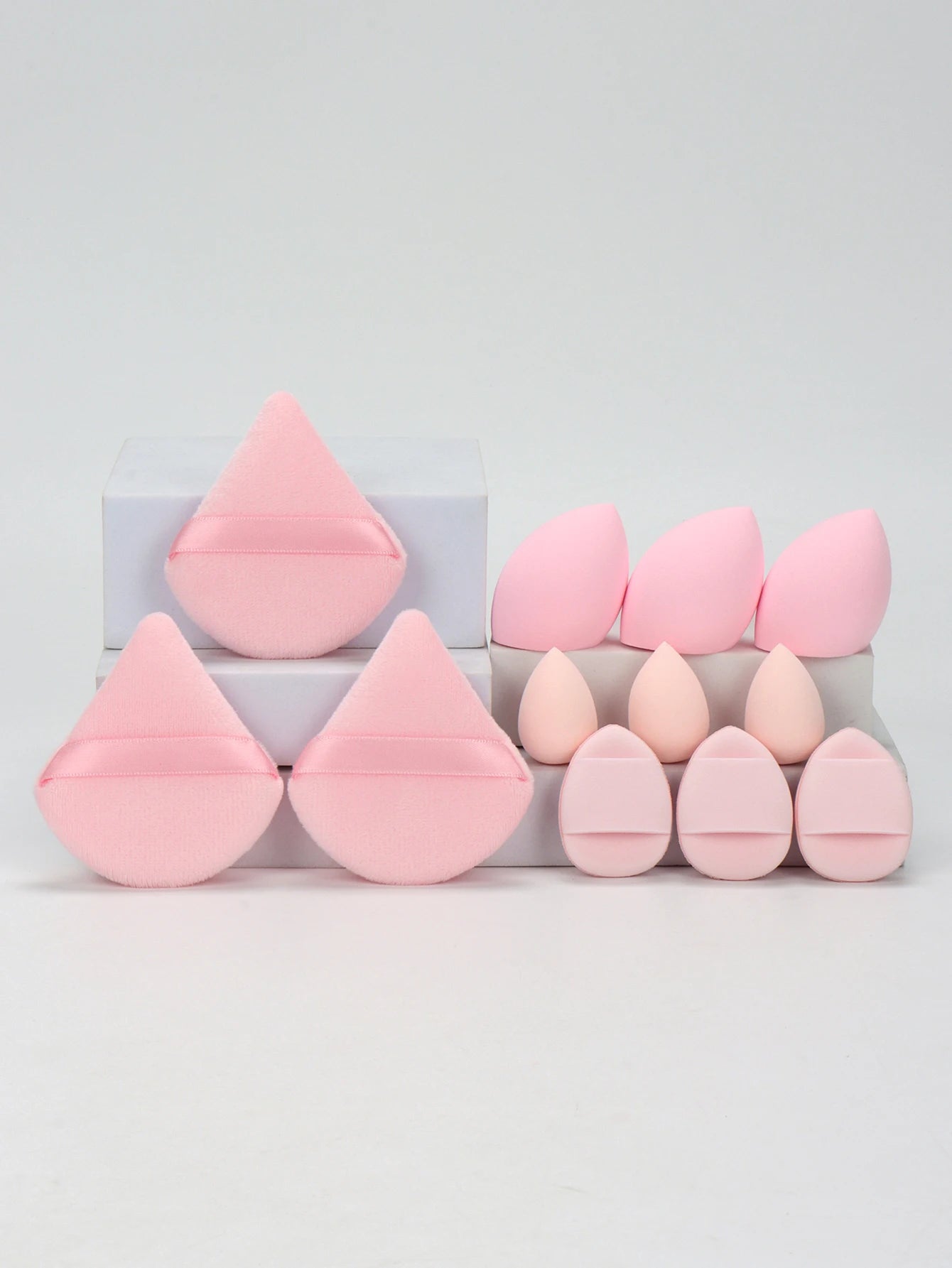 “12-piece makeup sponge set: powder puffs, air cushion puffs, and beauty eggs.”