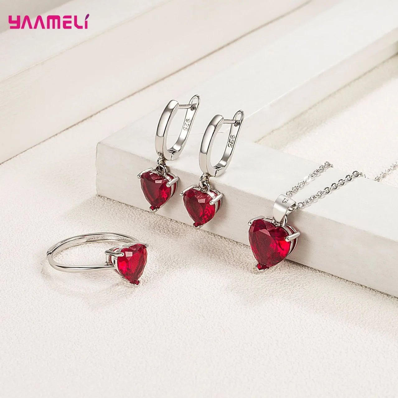 “Romantic 925 Sterling Silver Jewelry Set - Heart-Shaped Zircon Earrings, Necklace, and Ring.”