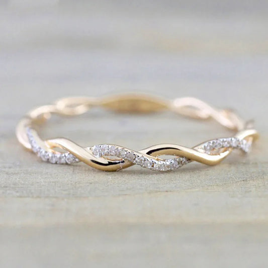 “Huitan Simple Stylish Thin Rings - Twist Band with Shiny CZ for Daily Wear.”