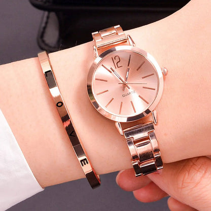 “2pcs Set Luxury Women’s Watch - Simple Dial, Hollow Strap, Gold Bracelet Quartz Wristwatch.”