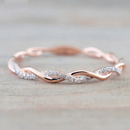 “Huitan Simple Stylish Thin Rings - Twist Band with Shiny CZ for Daily Wear.”
