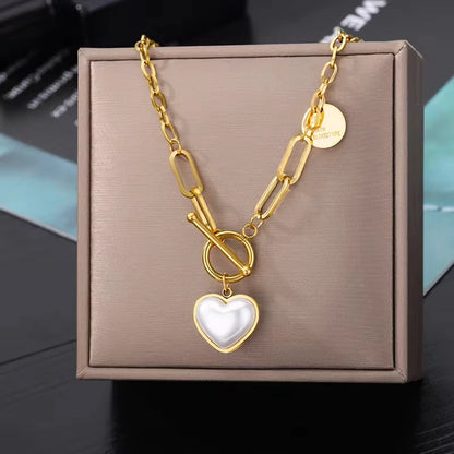 “316L Stainless Steel Heart Necklace - Multilayer Gold Goth Jewelry.”